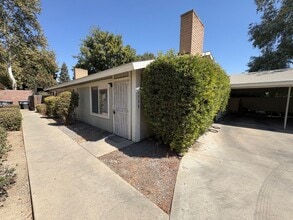 Building Photo - Move in ready apartment available now!
