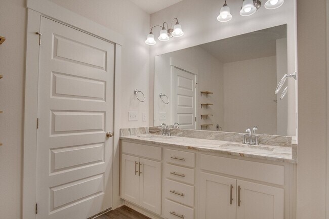 Building Photo - Spacious Cantonment Townhome with Open Layout, 2-Car Garage, Covered Back Porch & Easy Access to ...