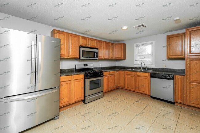 Building Photo - 1308 S 75th E Ave