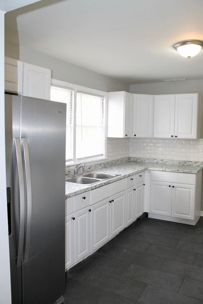 Building Photo - Luxurious Newly Renovated 3BR/2BA Haven with Private Parking - A Rare Market Gem