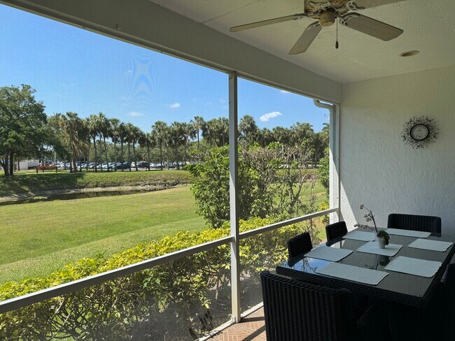 Patio with waterfront views - 21478 Saint Andrews Grand Cir