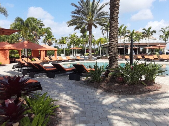 Building Photo - Seasonal/short term turnkey furnished Incredible 2/2 with den ground floor condo in resort Esplan...