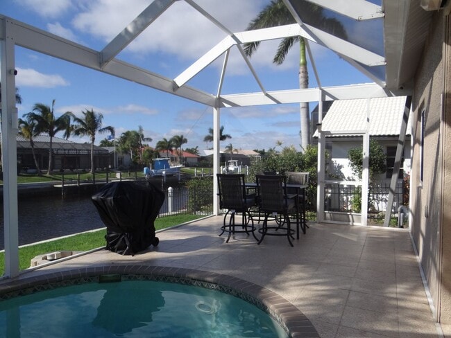 Building Photo - AVAILABLE 2027 SEASON!  TOP OF THE LINE PUNTA GORDA ISLES POOL, SALTWATERFRONT HOME FOR RENT! $74...