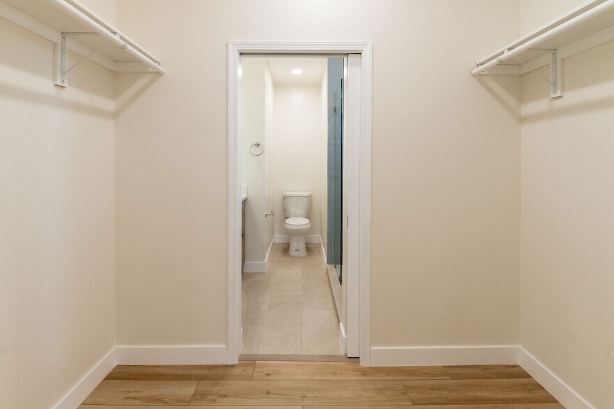 View from Primary bedroom into Primary bath - 4774 Bancroft St