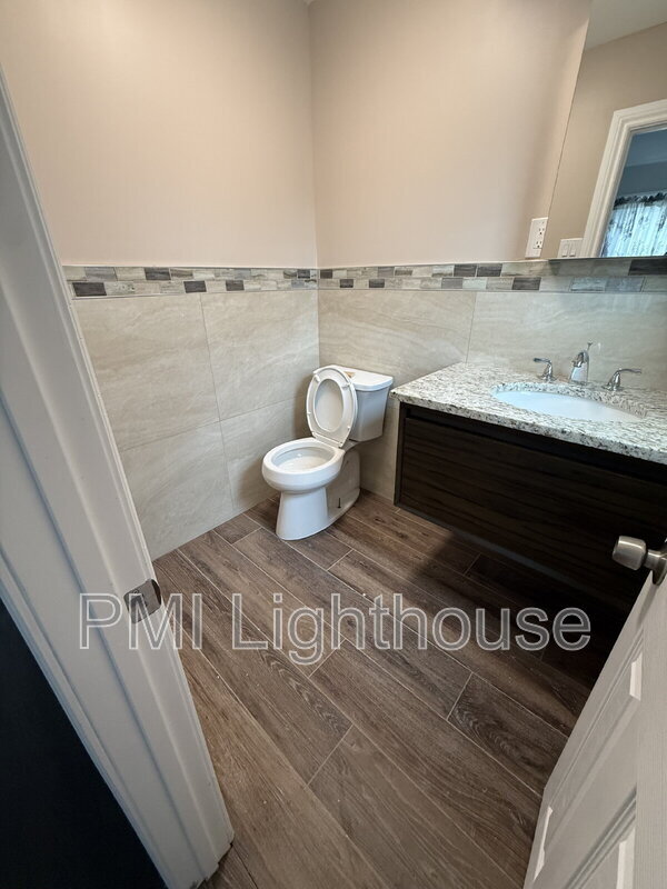 Building Photo - 115 8th Ave