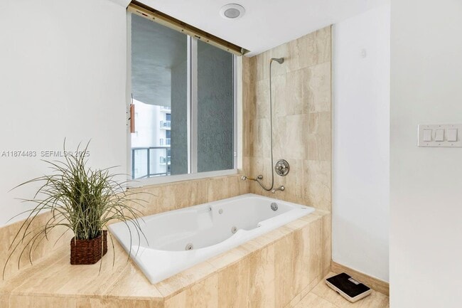 Building Photo - 18671 Collins Ave