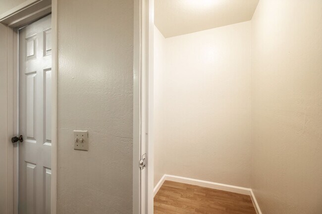 Building Photo - Peaceful Forest-View Condo with Fireplace & Private Balcony in Golden Oaks