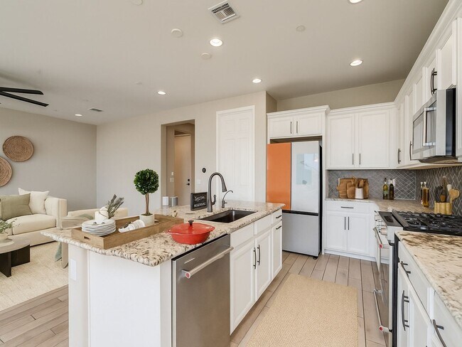 Building Photo - Amazing 4BR 2.5BA Home w/ 3-Car Tandem Garage • Pool Access • Yard w/ Fire Pit in Saguaro Trails