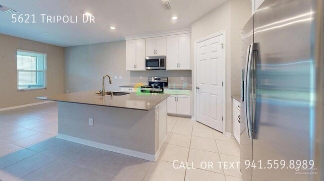 Building Photo - 5621 Tripoli Dr