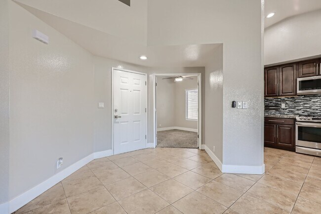 Building Photo - Discover this spacious and well-appointed 2-bedroom + office/den, 2-bath condo located in the hig...