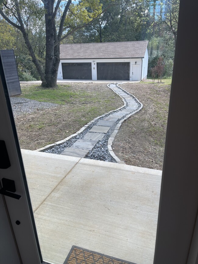 Path from back door to garage - 2312 Island Home Ave