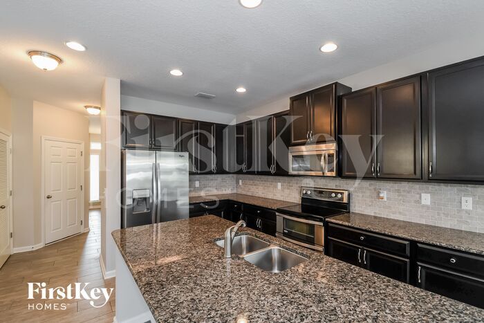 Building Photo - 7031 Azalea Grove Dr