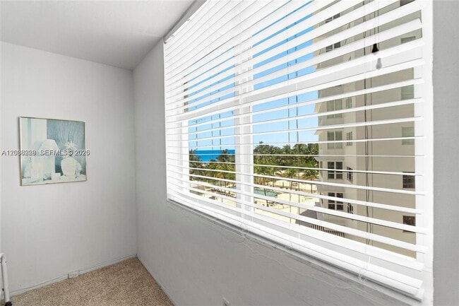 Building Photo - 5001 Collins Ave