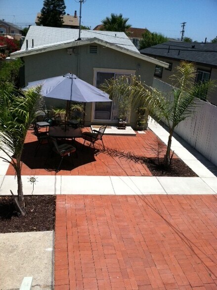 View looking from unit B toward shared patio - 4226 Wilson Ave