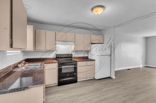 Building Photo - On Special: Two Bedroom Ranch Duplex in North Gallatin!