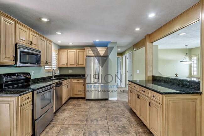 Building Photo - 6842 S Enchanted Dr