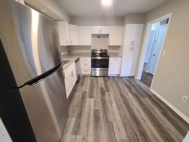 Building Photo - COMING SOON: Beautiful 4BR 2.5BA Home w/ Renovated Kitchen • Granite & Stainless • Garage Parking...