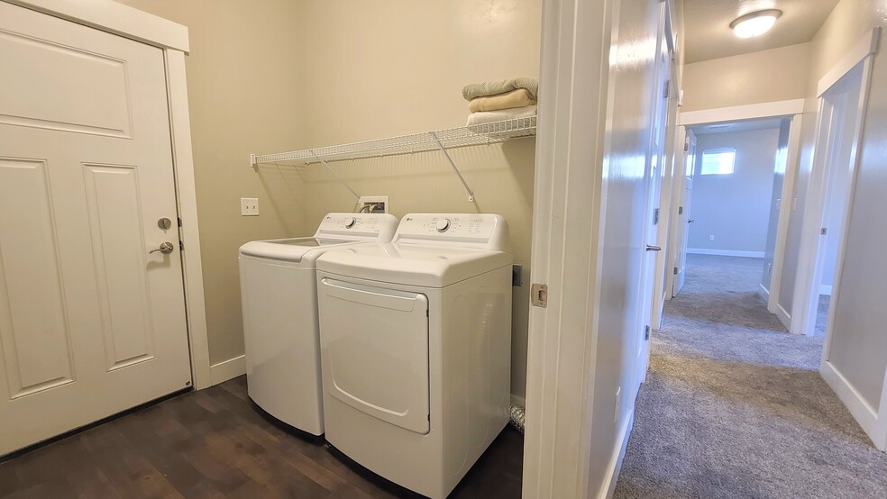 Shared laundry room - door to garage - 74 Silver Springs Drive