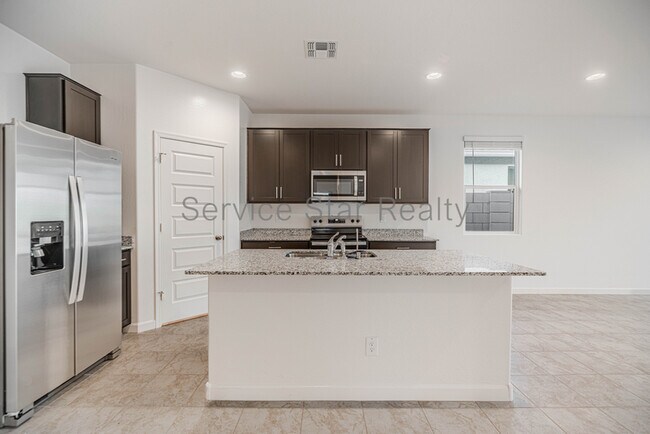 Building Photo - 5549 E Cinder Ln