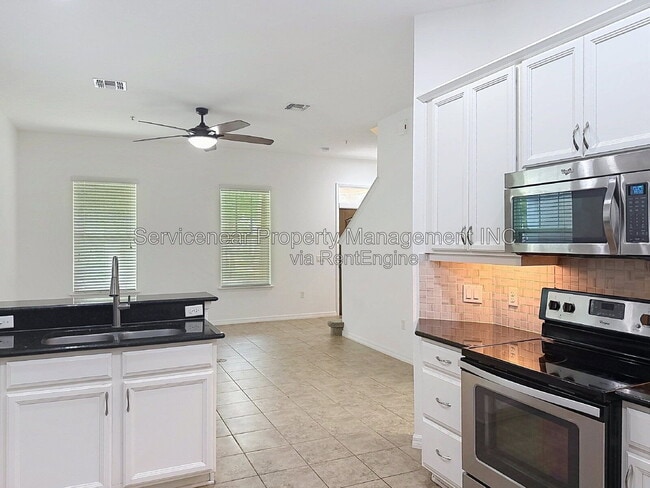Building Photo - 9428 Woodcrane Dr