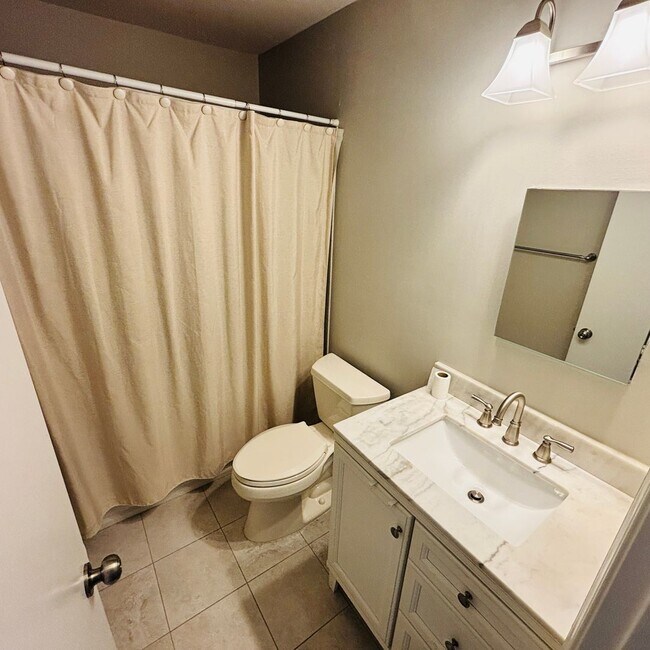 Building Photo - Spacious 3-Bedroom, 3-Bathroom Townhome with Finished Basement, Garage & Fenced Yard