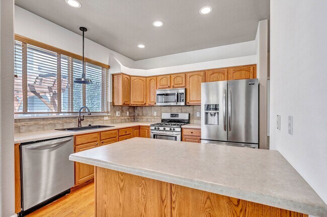 Building Photo - Beautiful Monument Ranch with Finished Basement & Low-Maintenance Living!