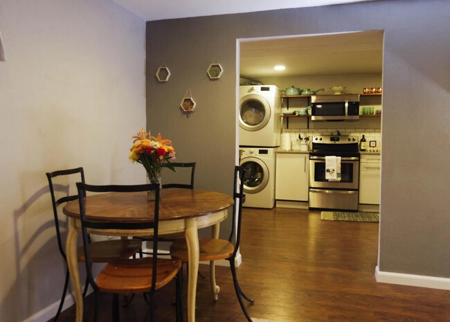 downstairs living/dining into kitchen - 4038 Kalamath St