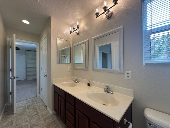 Building Photo - Three Bedroom Corner Lot Home