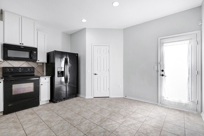Building Photo - ***APPLICATION CURRENTLY UNDER REVIEW***Luxurious Move-In Ready Home with Versatile Living Spaces