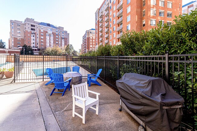 Gas grill and gas firepit on pool plaza. - 3800 Fairfax Dr