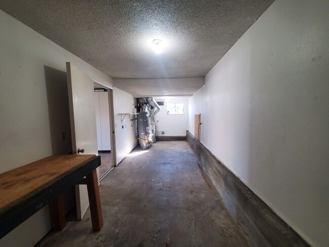 Building Photo - Private 2x2 Santa Rosa Townhouse with pool, 2-car garage, workshop area, fireplace, W/D Hookups