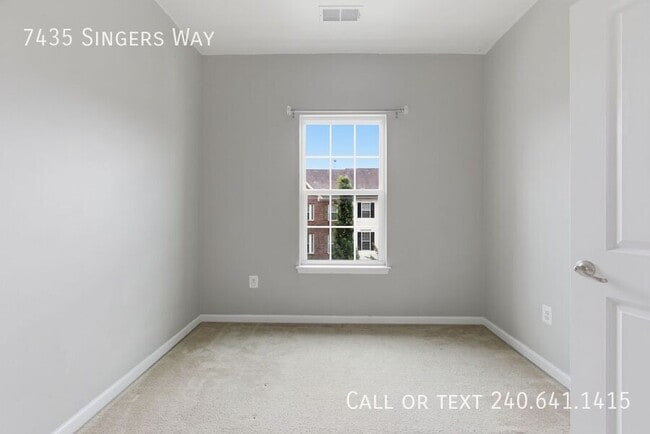 Building Photo - 7435 Singers Way