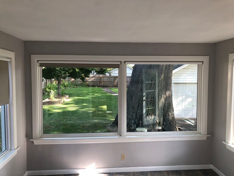 Sunroom with new windows - 6959 Pernod Ave