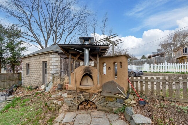 Building Photo - Lauraville 4-Bedroom, 2-Bathroom American Foursquare Home with Beautiful Outdoor Space