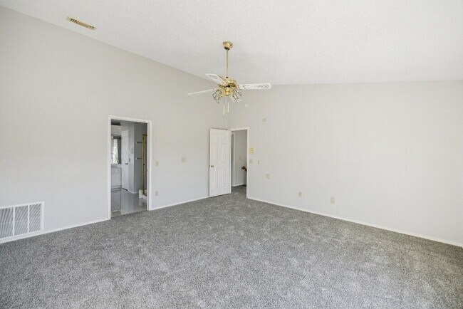 Building Photo - "Spacious 4-Bedroom, 2.5-Bath Living Meets Storybook Backyard Charm!"