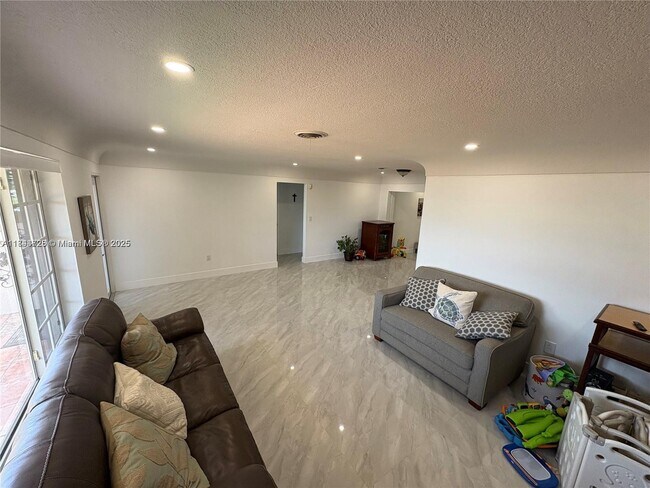 Building Photo - 6612 Dahlia Dr