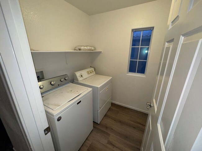 Building Photo - Fresh Paint/New Flooring all inside! Four ...