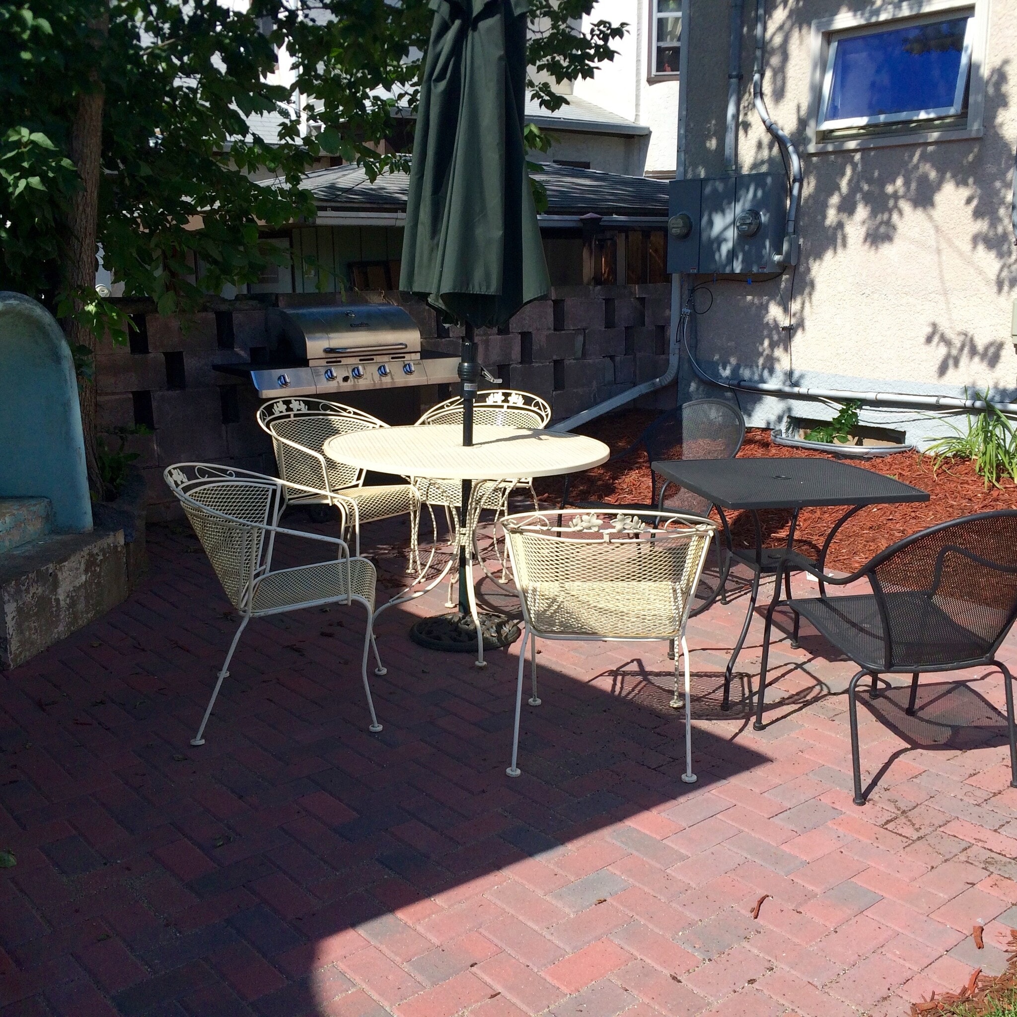 Patio shared with downstairs tenants. Gas grill and furniture provided by landlords/homeowners. - 1320 Jefferson St NE