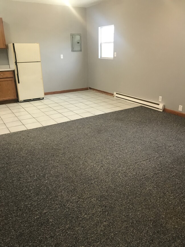 Living room facing dining area - 278 E 6th St