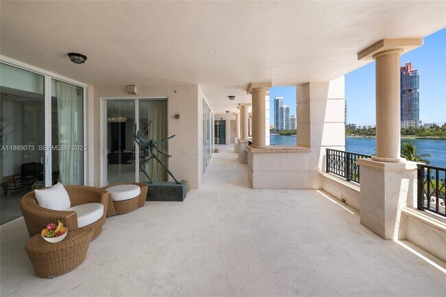 Building Photo - 7133 Fisher Island Dr