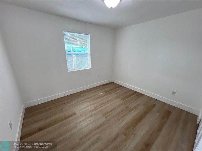 Building Photo - 10540 NW 28th Ave