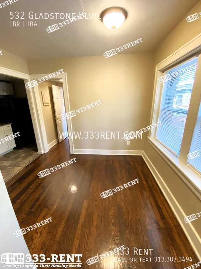 Building Photo - You'll love the gleaming hardwood floors a...