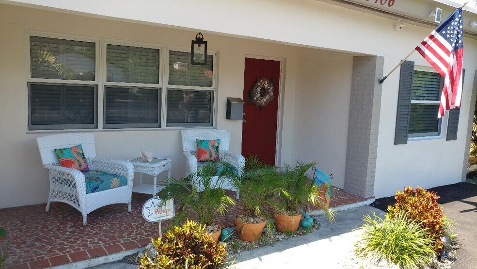 Front Porch with Flag - 3406 Norfolk St
