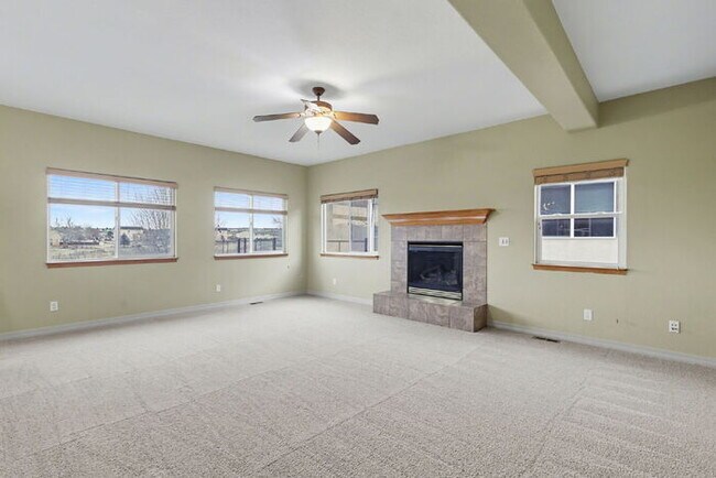 Building Photo - Spacious 5-Bedroom Home Backing to Open Space with Mountain Views