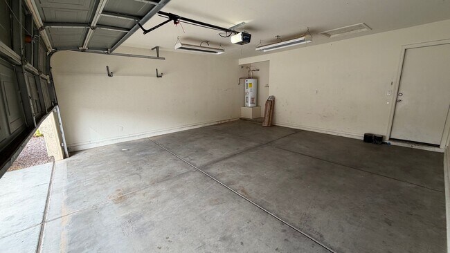 Building Photo - Two Story Home with NEW tile and a large backyard!