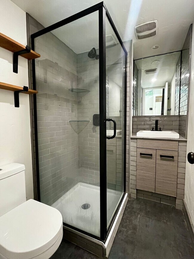 Building Photo - Modern Private Studio with Loft, Patio & Off-Street Parking