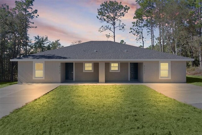 Building Photo - 9170 N Travis Dr