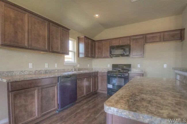 Building Photo - Stylish 4BR/2BA Home with Garage & Privacy...