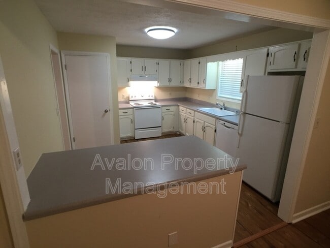 Building Photo - 5040 Woodland Dr NW