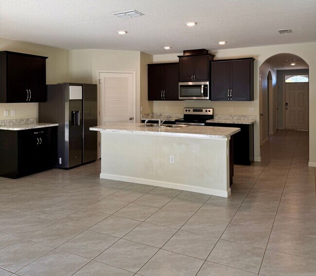 Building Photo - Palm Bay Pool Home Stunner!